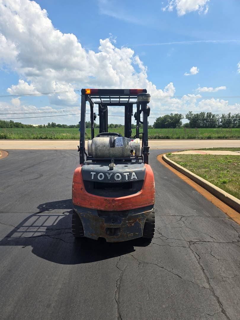 Rear view of Toyota forklift parked outdoors