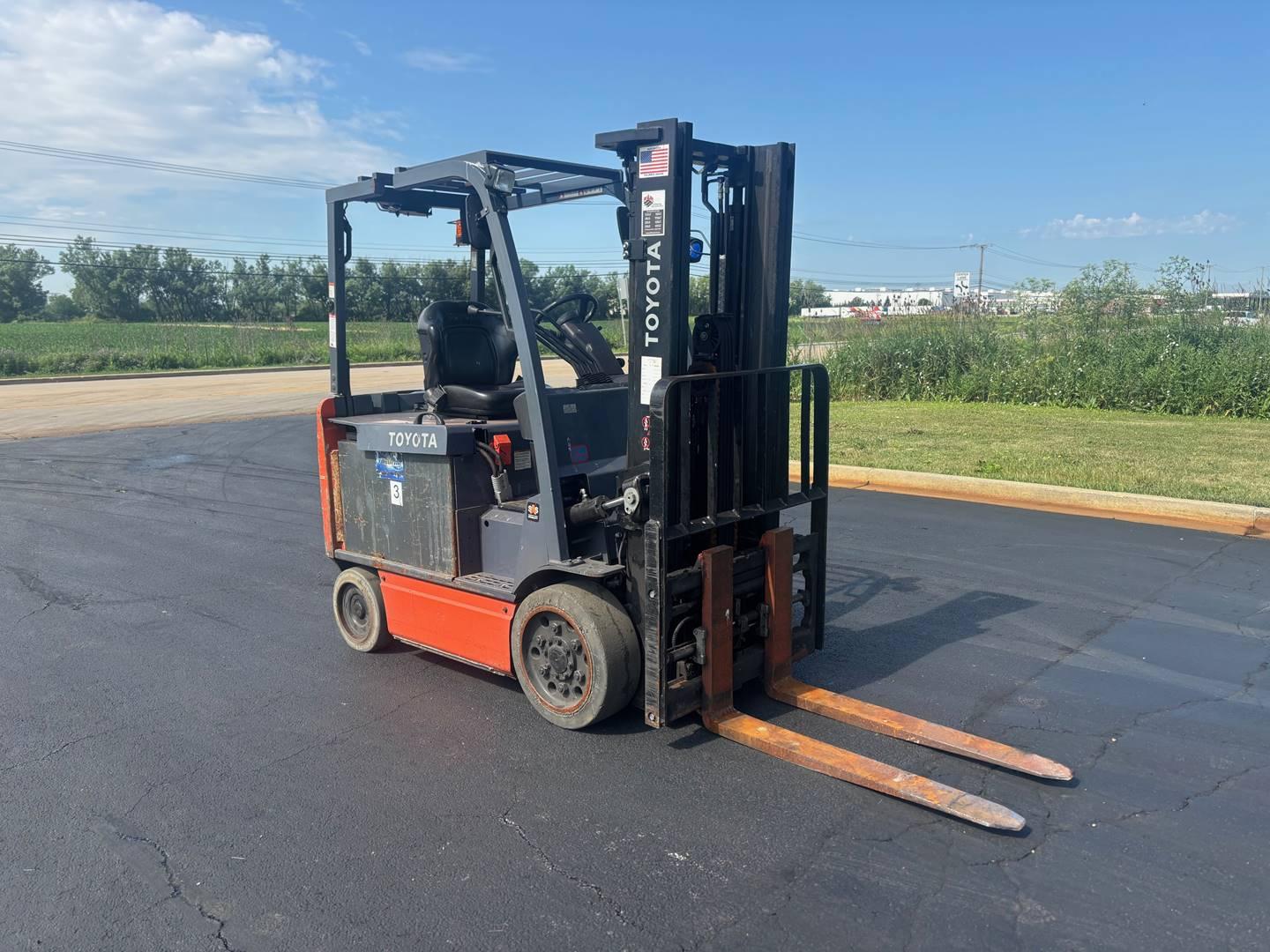 Toyota forklift angled view parked outdoors on pavement