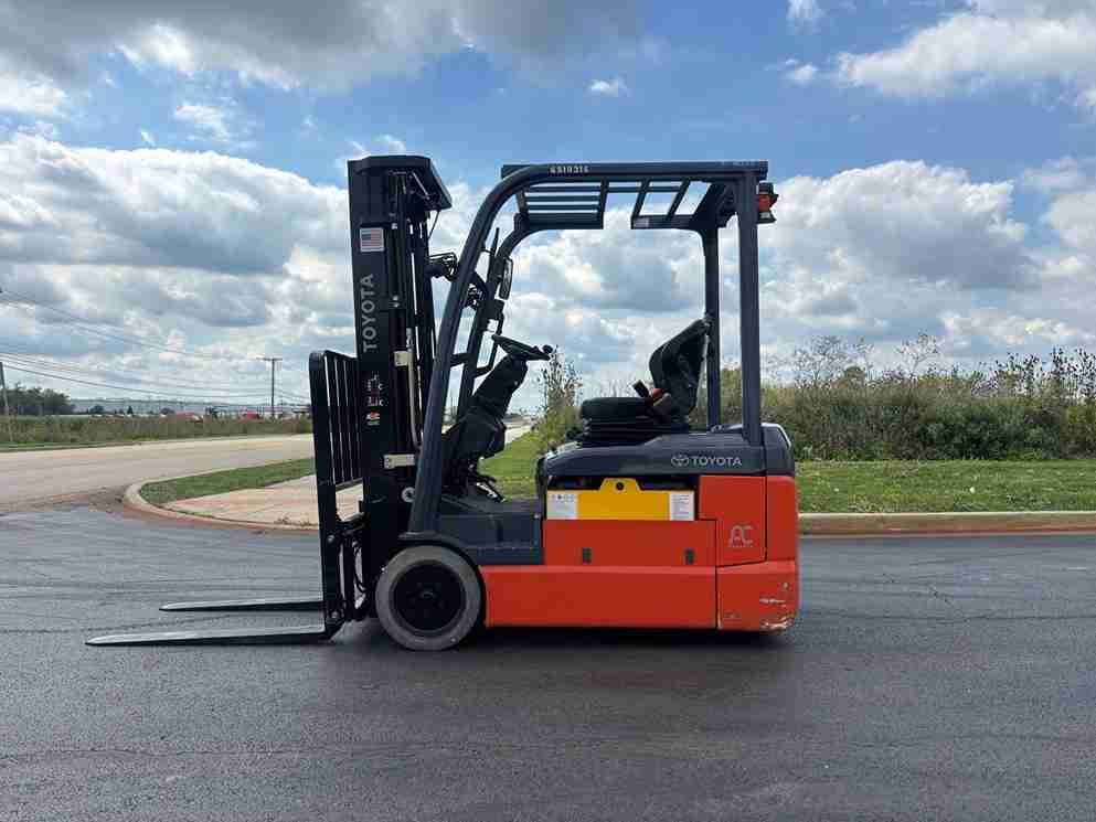 toyota electric forklift parked outdoor warehouse equipment side view battery powered forklift